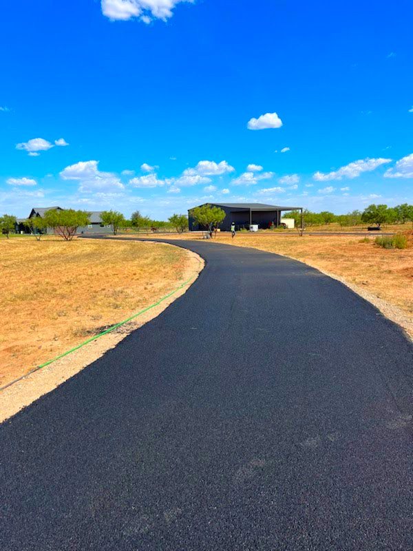 New asphalt driveway paved by West Tex Paving
