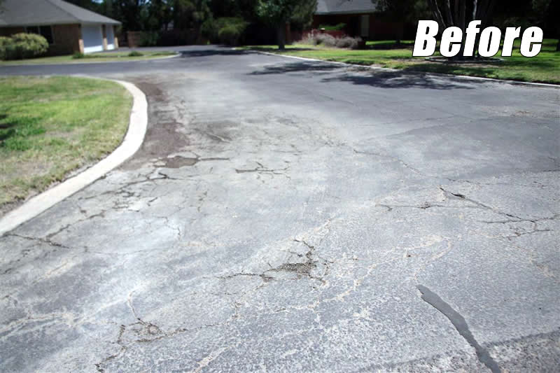 Asphalt driveway with a fresh sealcoat