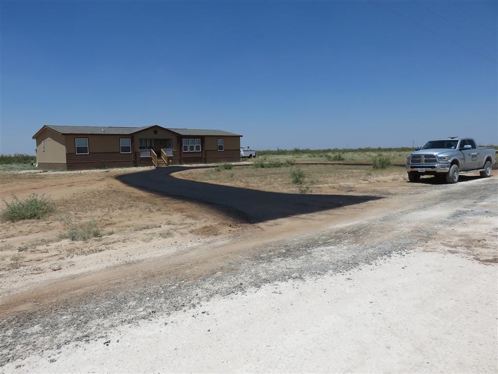 New asphalt circle driveway