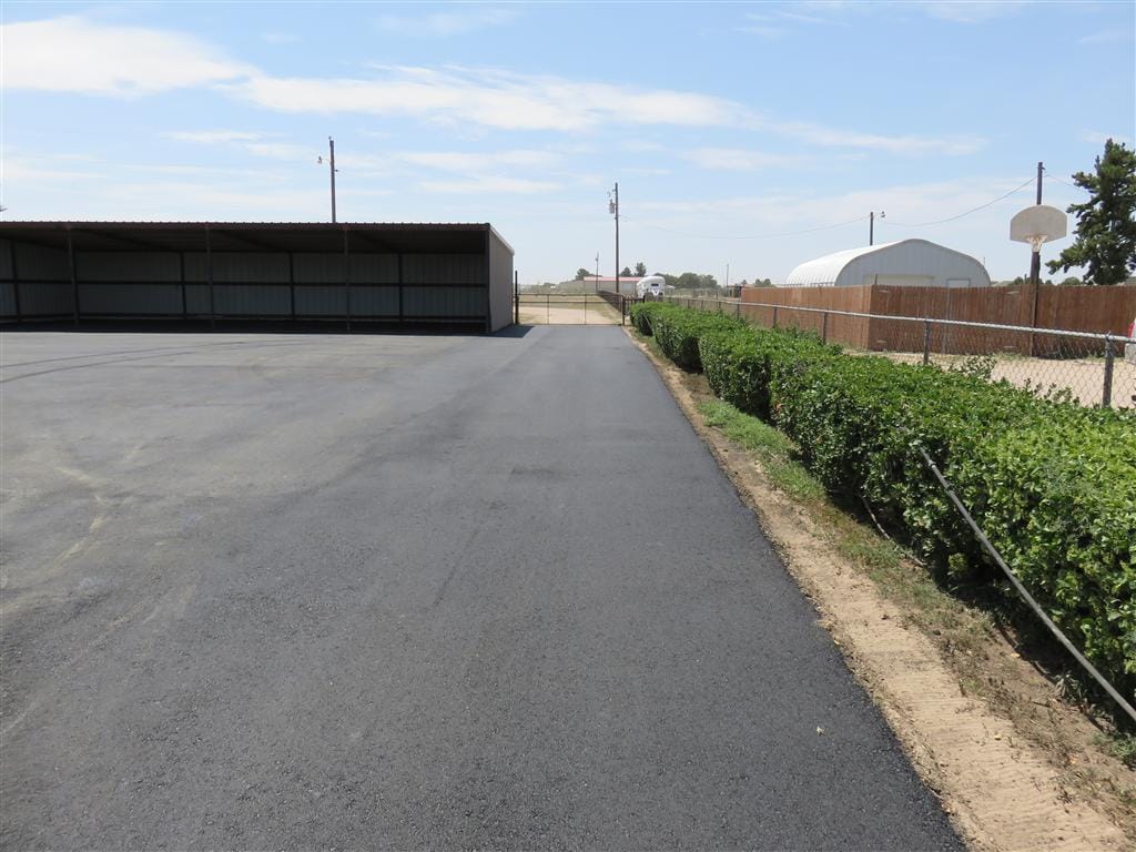 Hot mix going down on a residential driveway